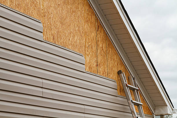 Professional Emergency Siding Repair technician working in Fredericksburg, OH